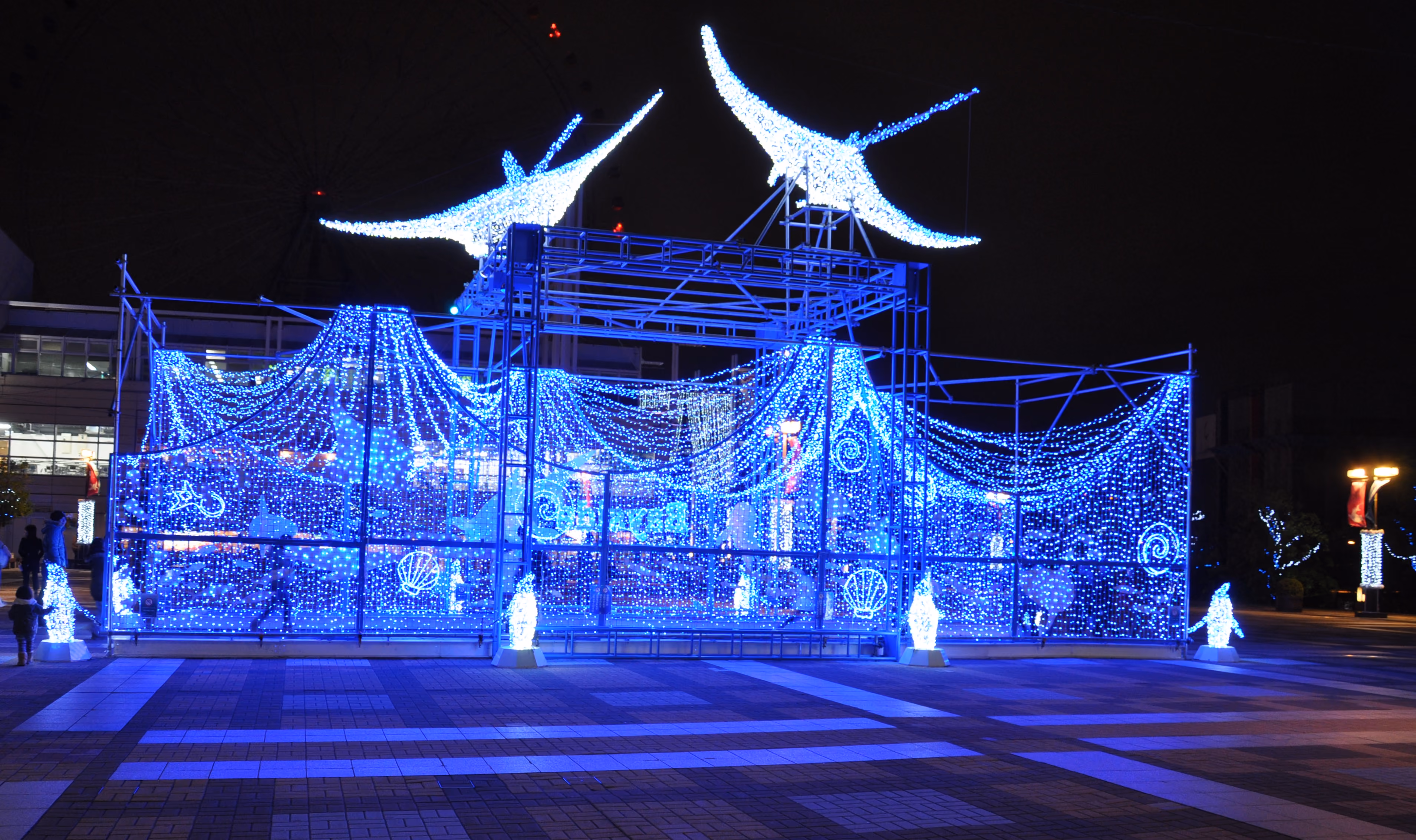 Illuminated decorations outside Osaka Aquarium Kaiyukan at night
