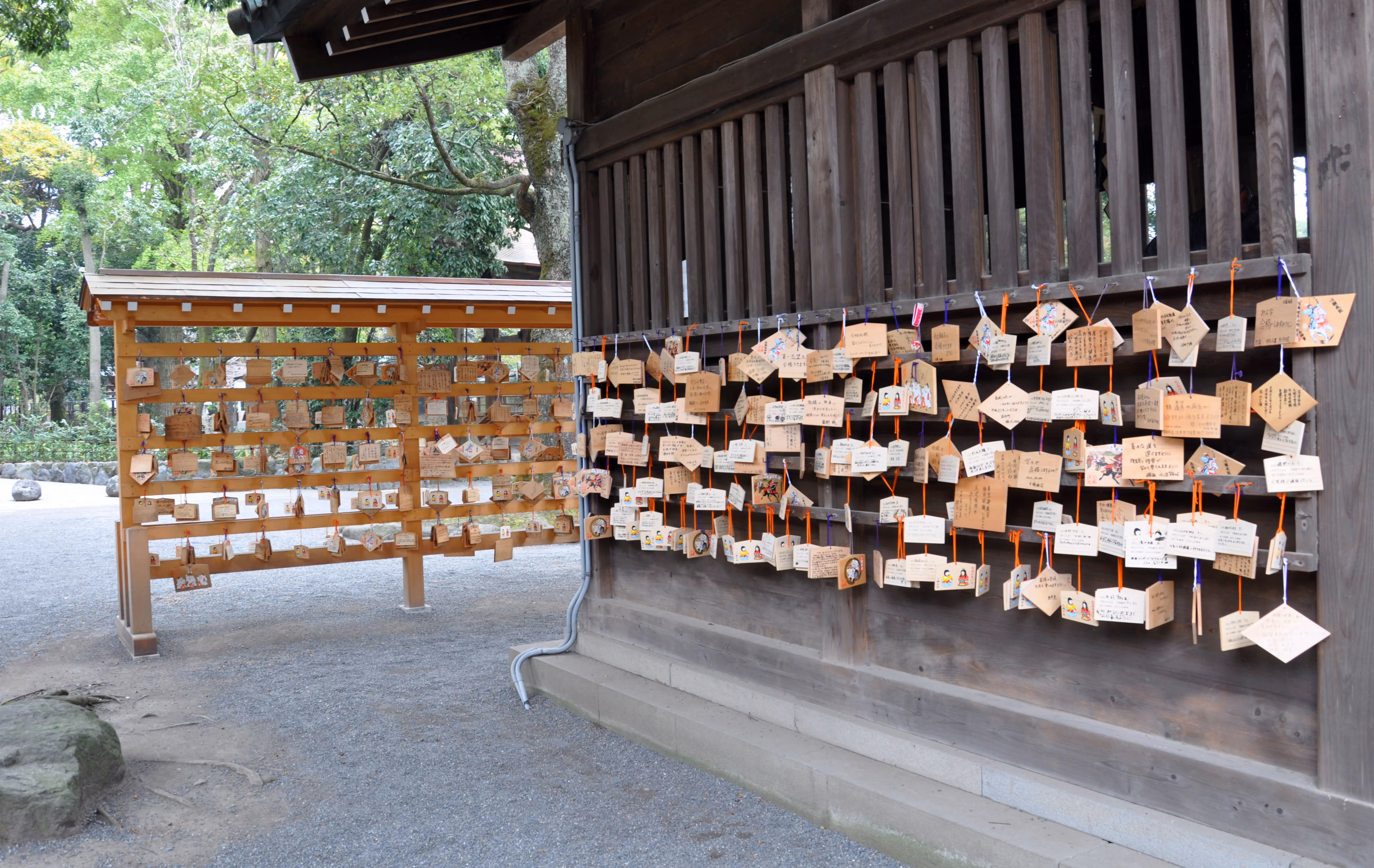 A wall covered in wooden ema votive plaques at Mishima Taisha