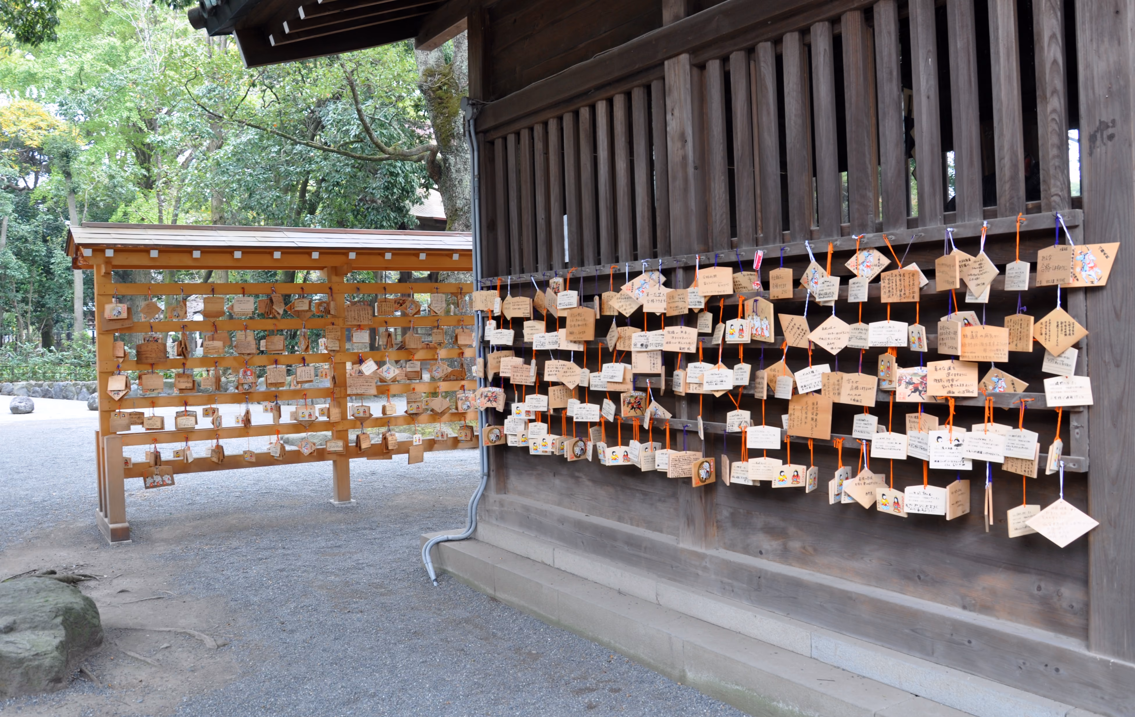 A wall covered in wooden ema votive plaques at Mishima Taisha